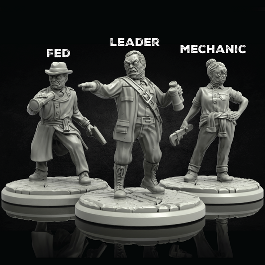Three gray resin figures labeled 'FED', 'LEADER', and 'MECHANIC' on a reflective surface with black background.