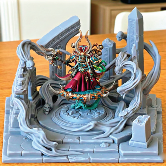 Detailed figurine on a decorative stand with intricate design