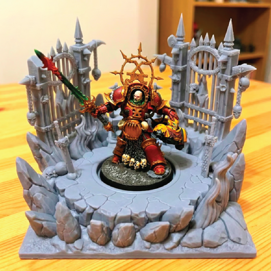 Warhammer figurine with ornate armor and weapon on a detailed base