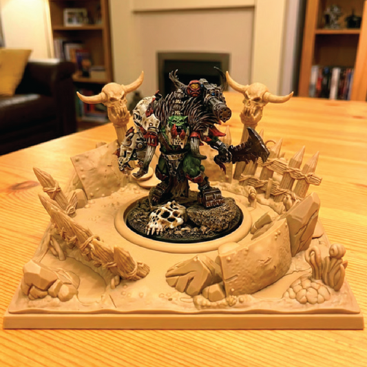 Game piece with a fantasy character on a decorative base on a wooden table