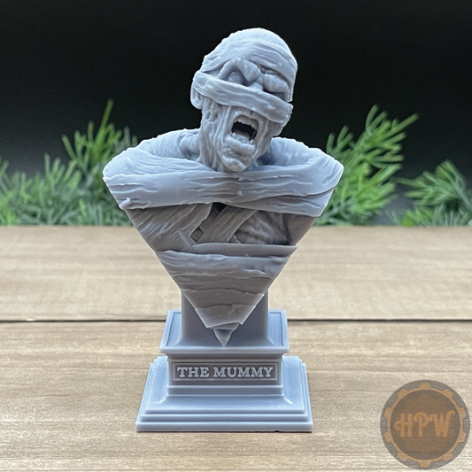 A bust of the Mummy 3D printed in gray UV resin.