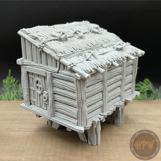 A Wood Shed terrain set 3D printed in gray filament.