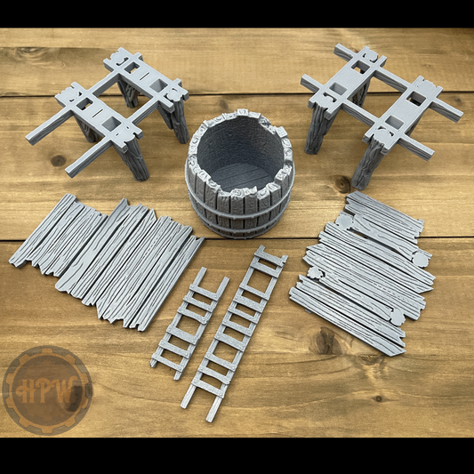 A gray miniature scale model of a water tower with ladders, part of the GameScape3D Sea Stack Cove terrain series.