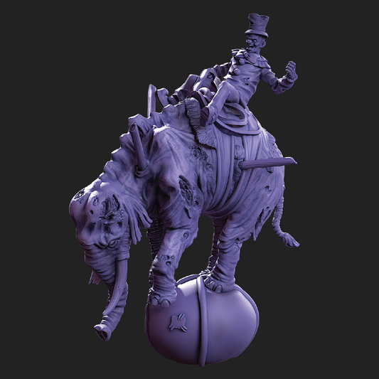 Statue of a man riding an elephant on a ball against a black background