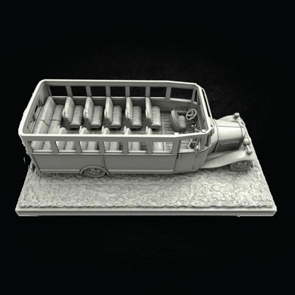 A monochrome miniature model of an open-top passenger bus with rows of seats visible inside, shown on a textured base against a black background.