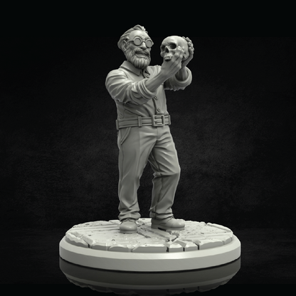 Statue of a man holding a skull on a dark background