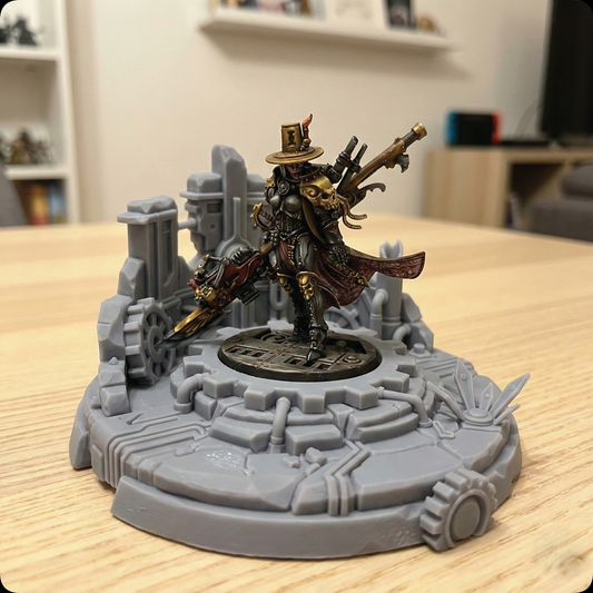 A tabletop photo of a painted fantasy miniature figure posed on a gray sci-fi themed base, set on a light wood table with a blurred home interior in the background.