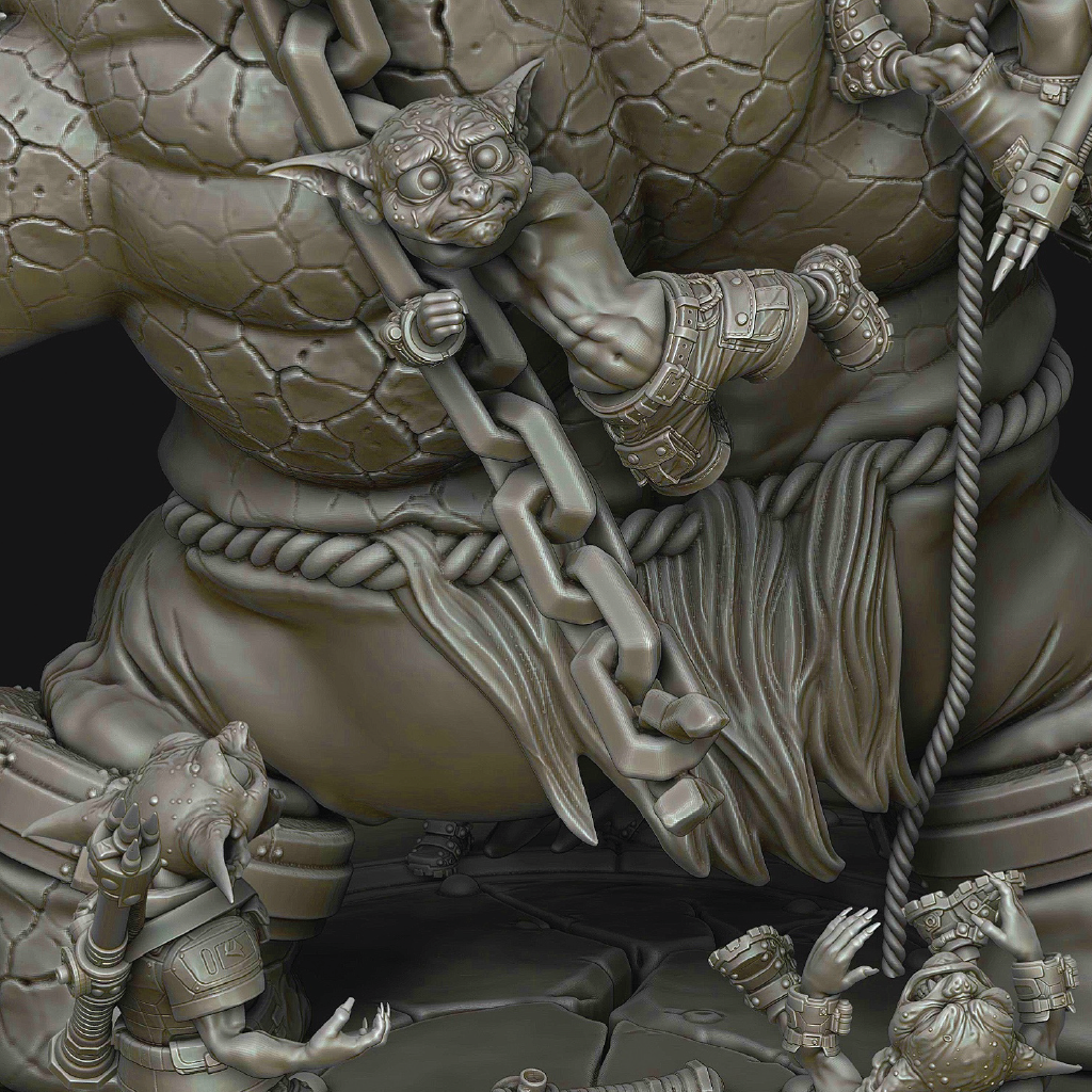 Close-up of a detailed fantasy miniature sculpt, showing a small goblin-like creature climbing a chain draped over a large stone creature's leg, with smaller figures at the base. The entire piece is rendered in a uniform matte gray resin or paint finish.