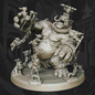 A detailed fantasy tabletop miniature sculpture of a goblin-like creature carrying smaller goblin figures, shown on a round display base against a dark illustrated backdrop.