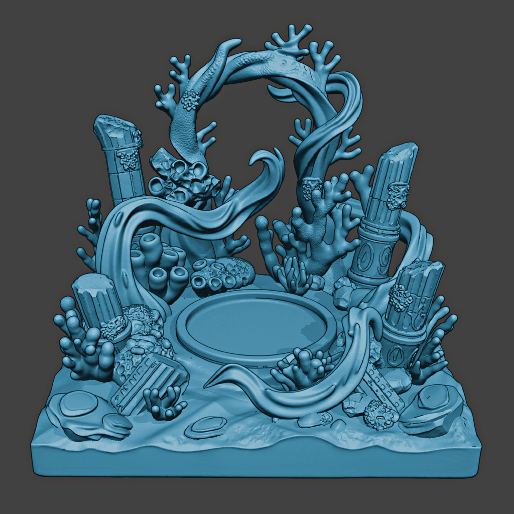 Blue underwater scene sculpture with corals and sea creatures on a dark gray background