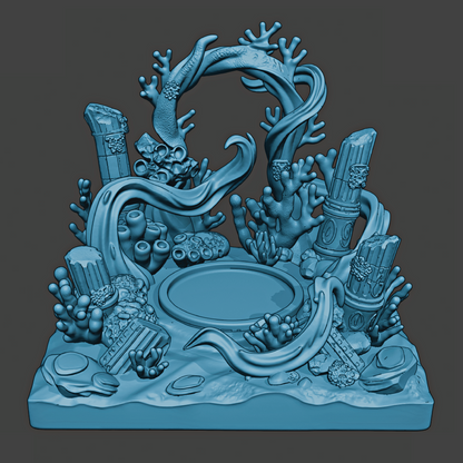 Blue underwater scene sculpture with corals and sea creatures on a dark gray background
