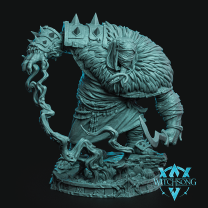 A fantasy warrior miniature figurine in a crouched, dynamic pose with a large furry head, spiked shoulder armor, and a curved weapon, shown in a uniform teal resin or 3D-printed material against a black background. A Witchsong logo appears in the lower right corner.