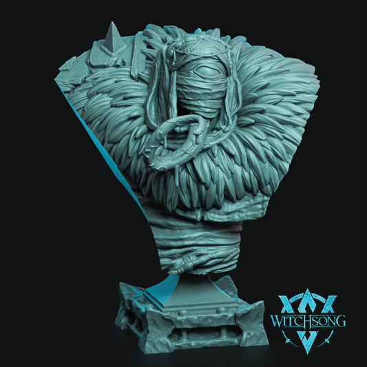 A fantasy bust sculpture of a wrapped figure with a large feathered or leafy headdress and a coiled snake around the head, mounted on a decorative base. The item is shown in a uniform aqua/turquoise color on a black background, with the Witchsong logo in the lower right corner.