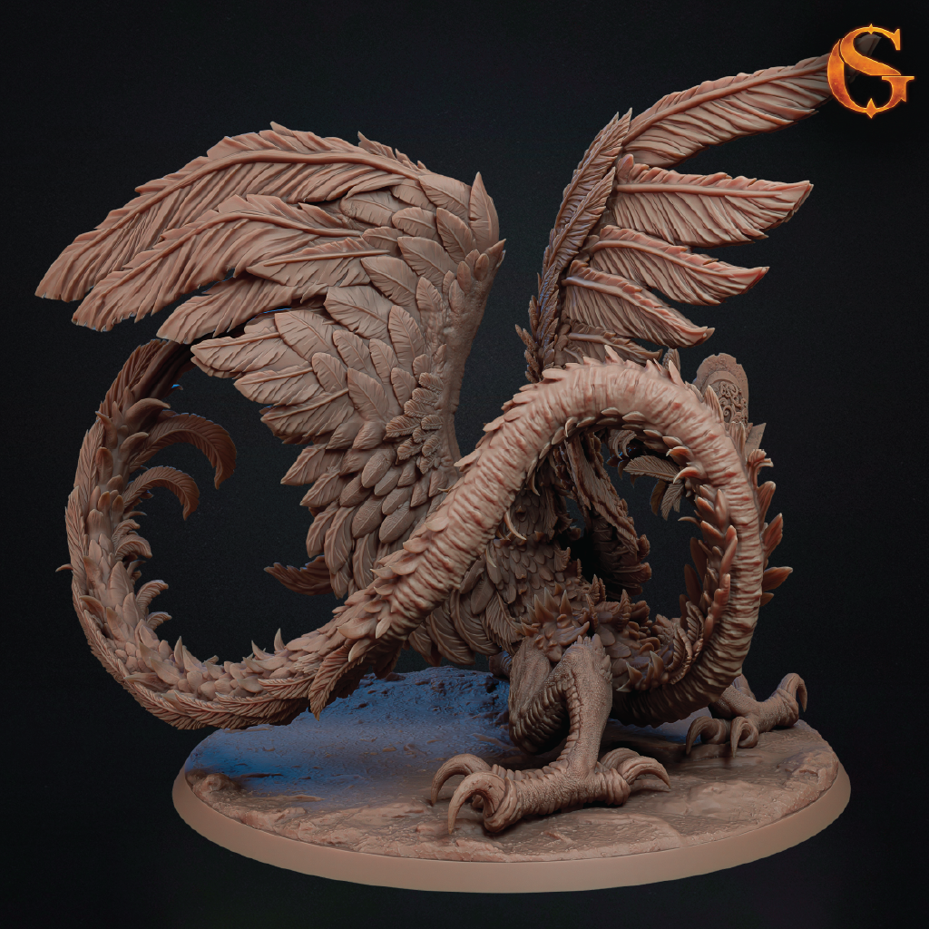 A detailed fantasy creature figurine or miniature sculpture with large feathered wings, a long curled tail, and clawed feet, shown on a round base against a dark background. The item appears to be a single molded or sculpted figure in a uniform warm brown/tan resin or paint, with no visible person, animal, or real environment.
