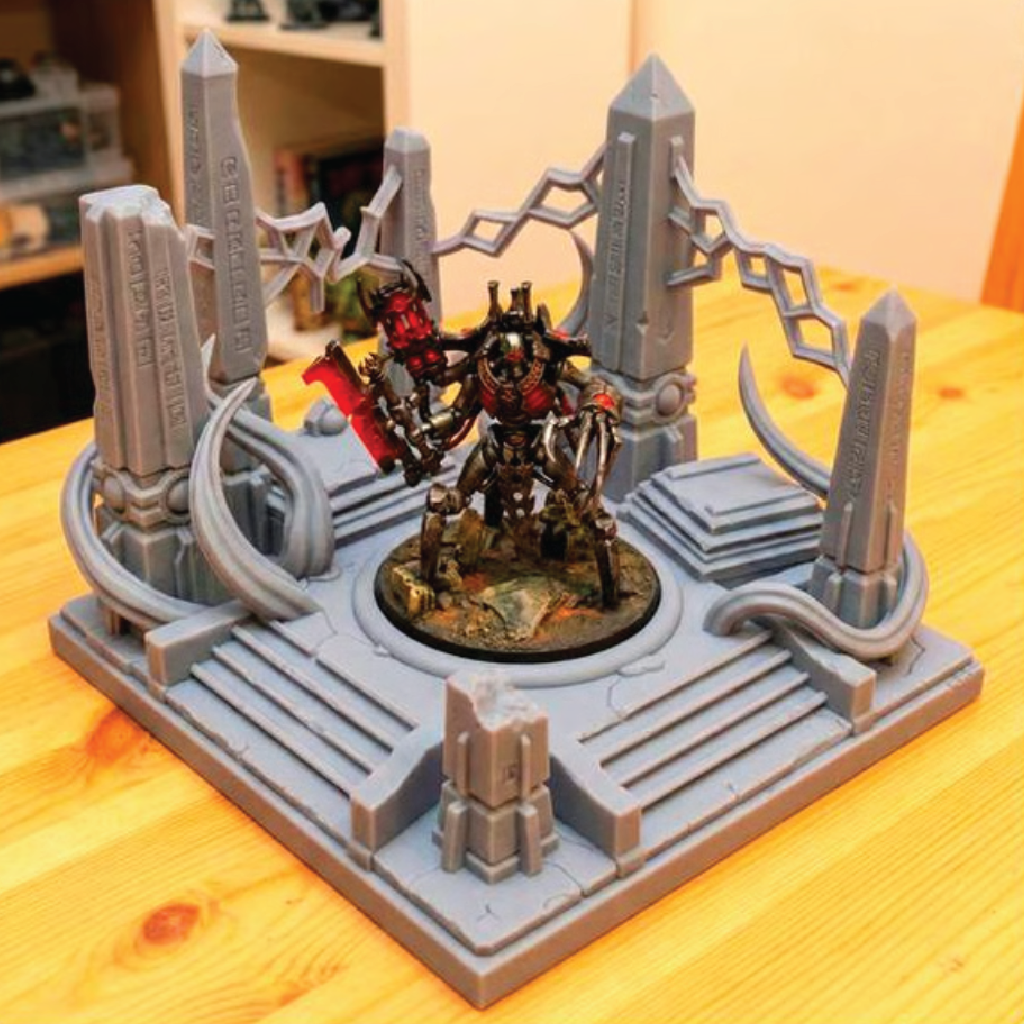 Tabletop miniature game setup with characters and architecture on a wooden surface