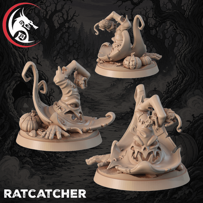 Three unpainted fantasy tabletop miniatures of a rat-like creature wrapped in a tattered cloak, shown from multiple angles on a dark illustrated background. The text 'RATCATCHER' appears at the bottom left, and a red-and-black dragon logo is in the top left.
