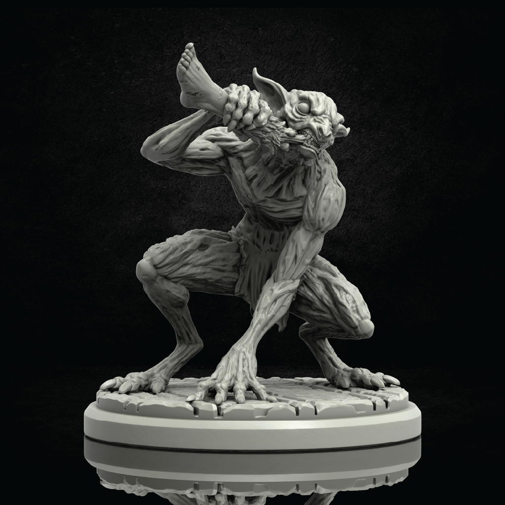 A gray unpainted fantasy creature figurine in a crouching pose, holding a severed head in its hands, displayed on a circular base against a dark background.