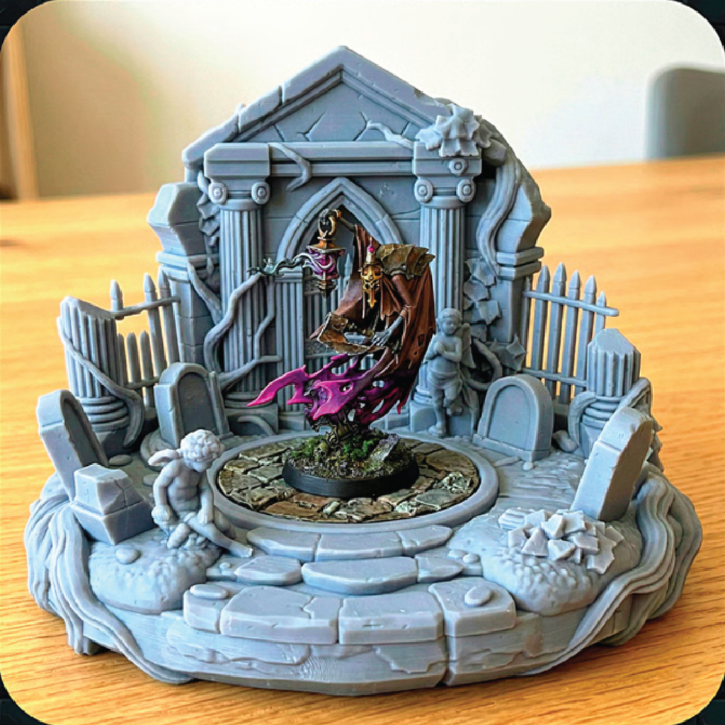 Detailed miniature model of a fantasy scene with architecture and characters on a wooden surface.