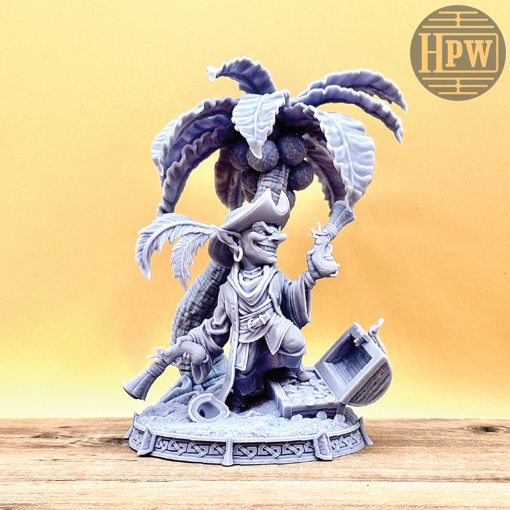 A goblin pirate wielding miniature blunderbusses standing under a palm tree and on top of an open treasure chest full of coins. This is a model 3D printed in gray UV resin.