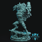 A fantasy figurine of a crystalline stone goblin or rock spirit standing on a rocky base, rendered in a uniform icy blue-green resin or paint against a black background. The Witchsong logo is visible in the bottom right corner.
