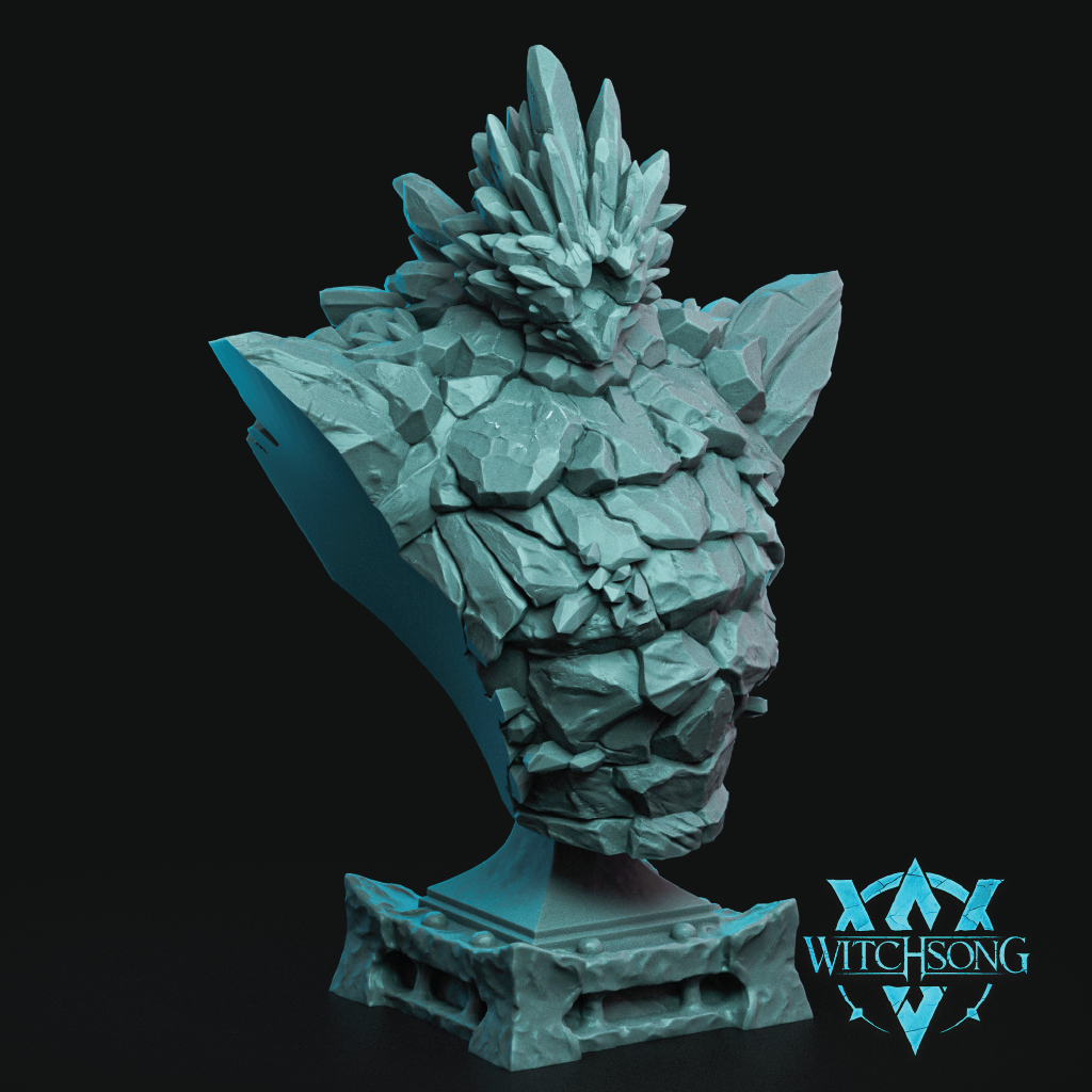 A fantasy bust sculpture of a rocky, crystalline creature's head on a pedestal, rendered in a light icy blue color against a solid black background. The Witchsong logo is visible in the bottom right corner.