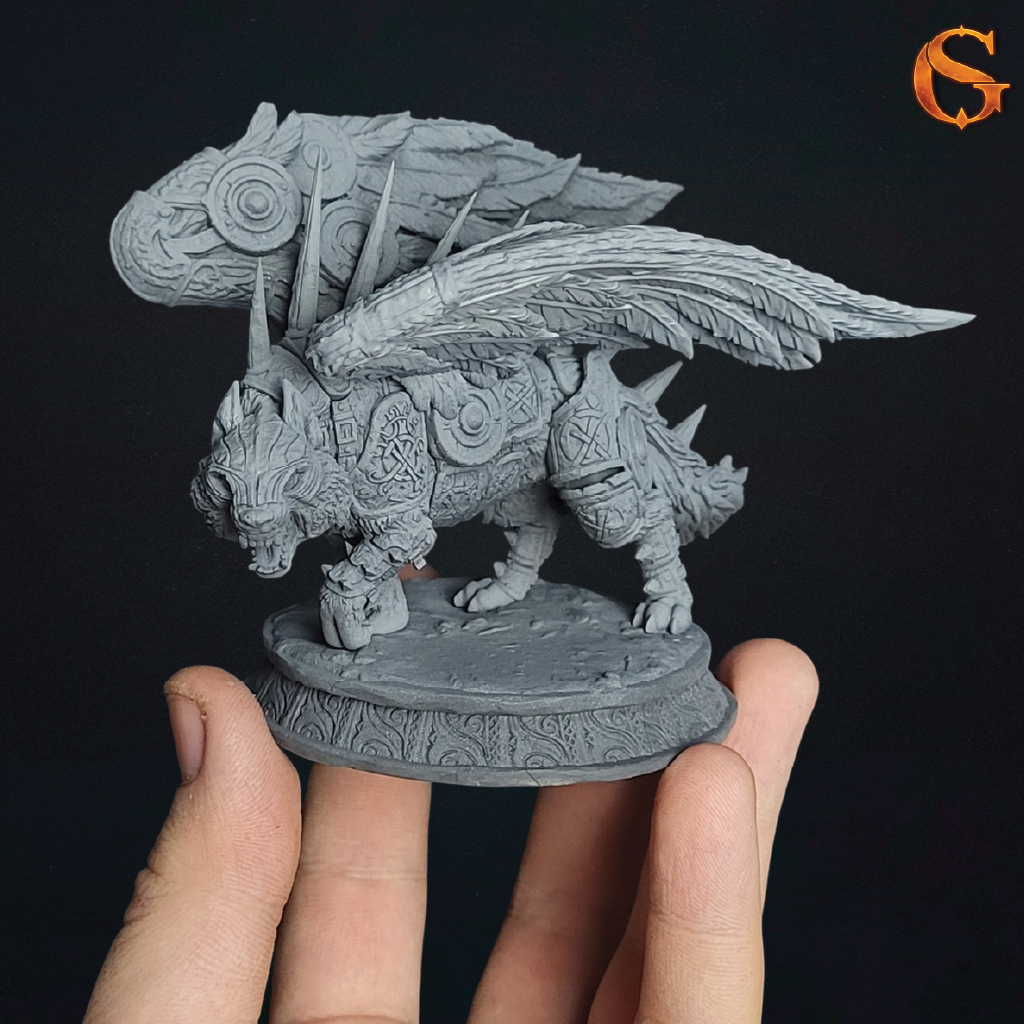 A hand holds a detailed gray fantasy creature miniature figurine with wings, spikes, and an ornate round base against a dark background.