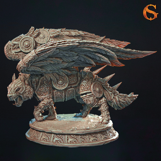 A highly detailed fantasy miniature figurine of a winged, armored beast standing on an ornate circular base, photographed against a dark studio background.
