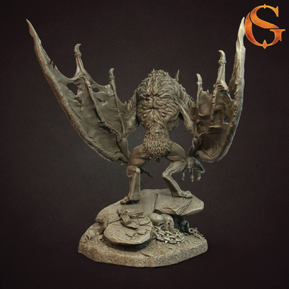 A detailed fantasy creature figurine with large spread wings, a muscular body, and a rocky base, shown against a dark brown background. An orange stylized 'G' logo appears in the top right corner.