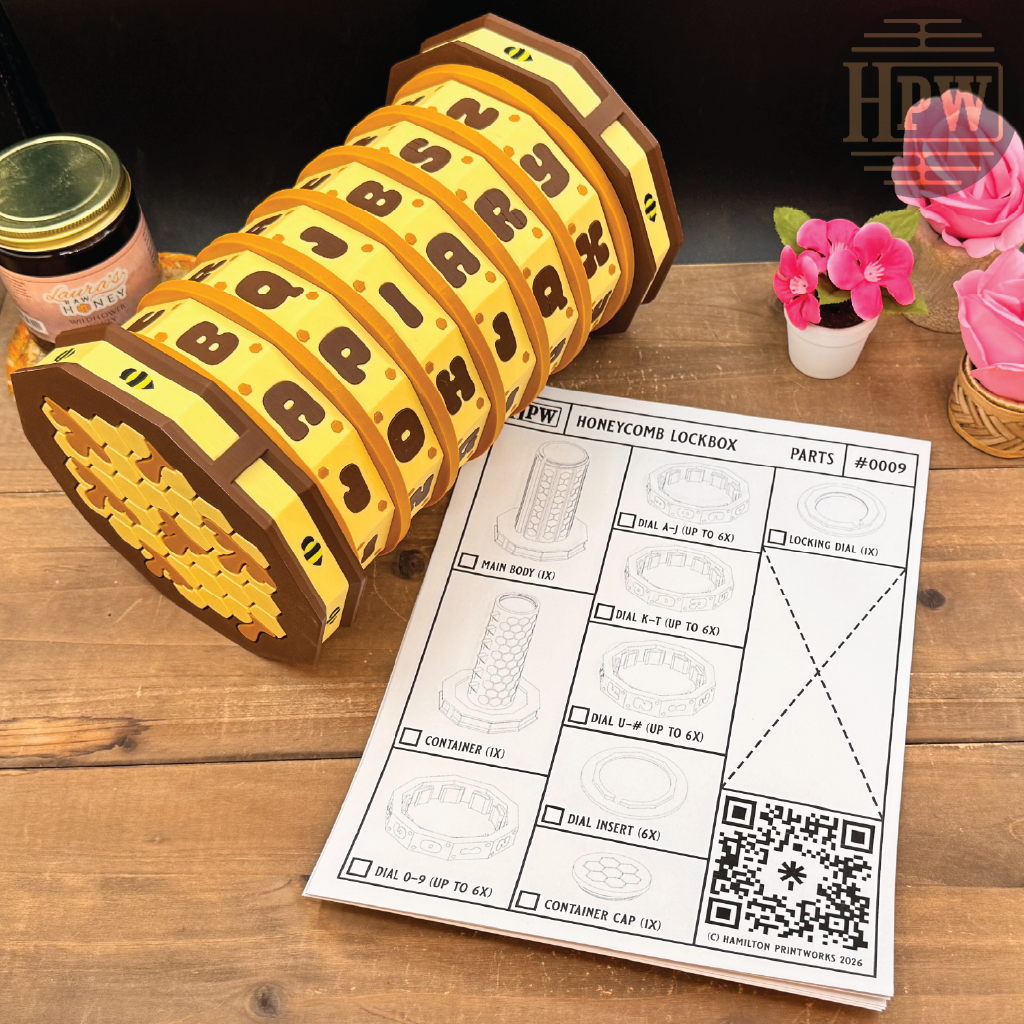 Honeycomb lockbox with puzzle pieces on a wooden surface