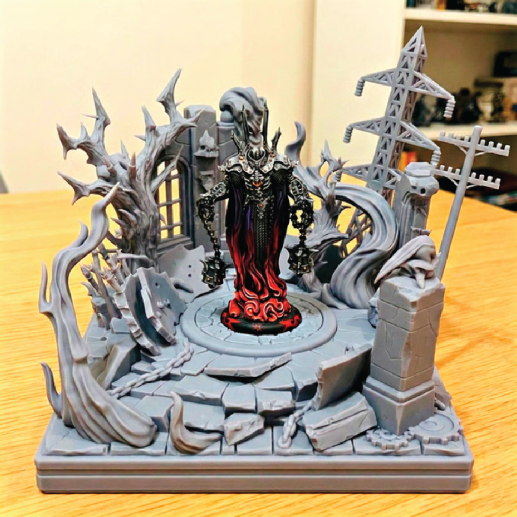 Detailed figurine with a dark, ornate design on a wooden surface