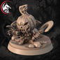 A 3D-rendered unpainted tabletop miniature of a cute cat-like character with a carved pumpkin head, standing on a round display base. The figure holds a curved sword and a small object in one hand, with a spooky forest background and a red-and-white dragon logo in the top-left corner.