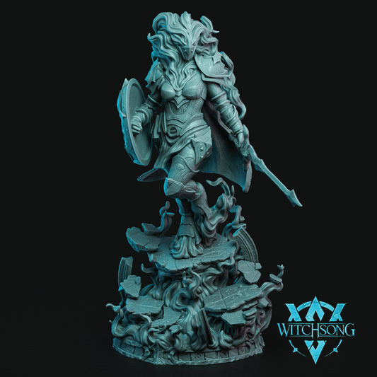 A fantasy warrior miniature figurine in a uniform light blue-gray resin, standing on a detailed rocky base with a shield and sword, set against a solid black background. The Witchsong brand logo is visible in the bottom right corner.