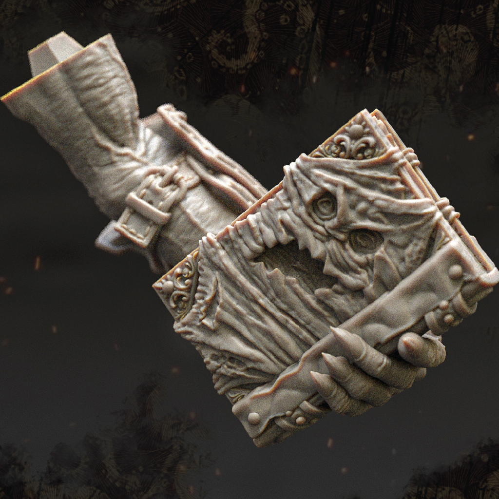 Decorative item resembling a mummy hand holding a book on a dark background