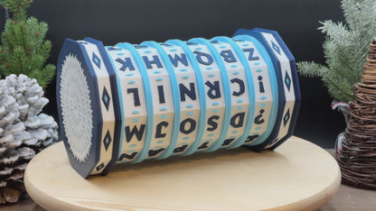 Decorative render of a puzzle box with letter patterns 