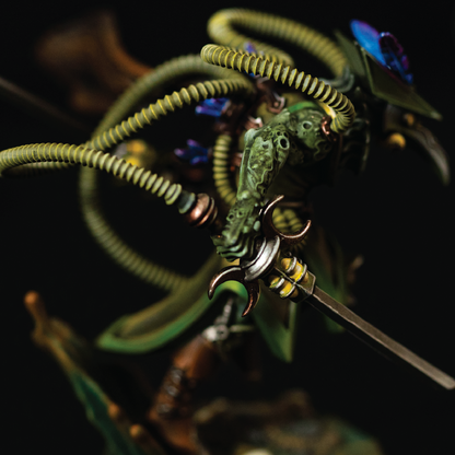 Close-up of a detailed dragon figurine with green scales and metallic elements on a dark background