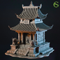 Model of a traditional East Asian pagoda with intricate details on a black background