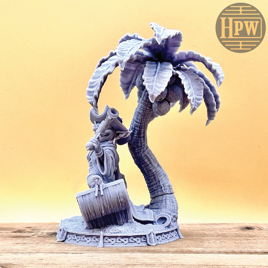 A goblin pirate wielding miniature blunderbusses standing under a palm tree and on top of an open treasure chest full of coins. This is a model 3D printed in gray UV resin.