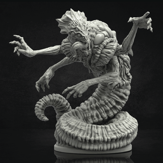 Monster figurine with snake-like body and humanoid head on a black background