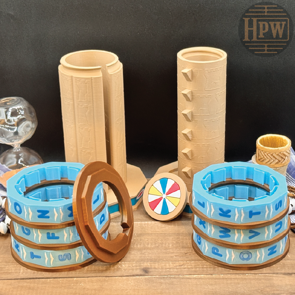 A set of 3D-printed Viking-themed tabletop gaming pieces, including two tall wooden-textured poles, two blue and brown rune-studded hoops, a small multicolor wheel, and a glass goblet prop, arranged on a wooden surface against a dark backdrop.
