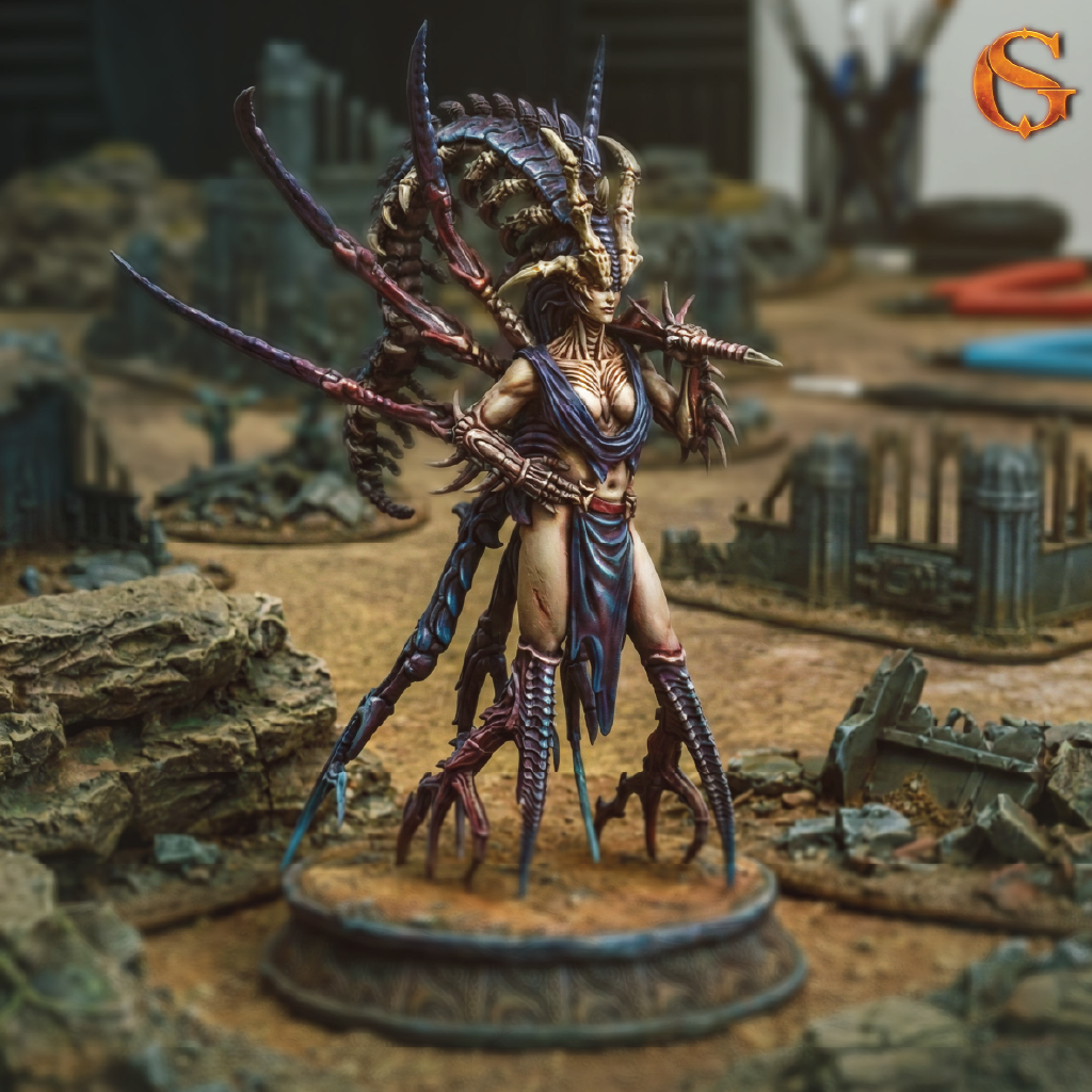 A oainted 3D resin print of a woman infected with an alien parasite attached to her head, her arms and legs transformed into sharp spikes and spines, ready for fierce battle, the miniature standing on a battlefield of ruined buildings and rocks