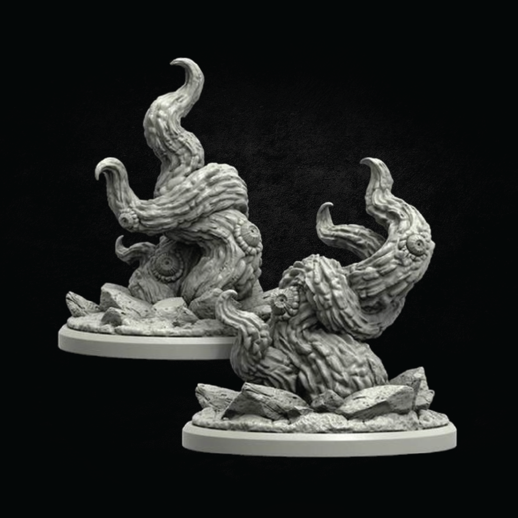 Two unpainted gray fantasy miniature terrain pieces shaped like twisted tree roots or gnarled rock formations, each mounted on a round base, shown against a black background.