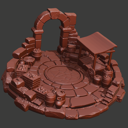A 3D-rendered miniature tabletop terrain piece in a uniform reddish-brown color, featuring a circular stone platform, ruined archway, barrels, crates, and a small shelter on a dark gray background.